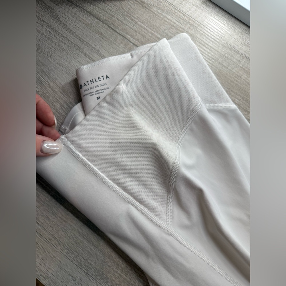 Athleta Cream Stay Fly 7/8 leggings with mesh panels